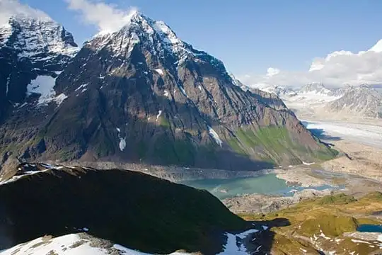a large mountain in the background