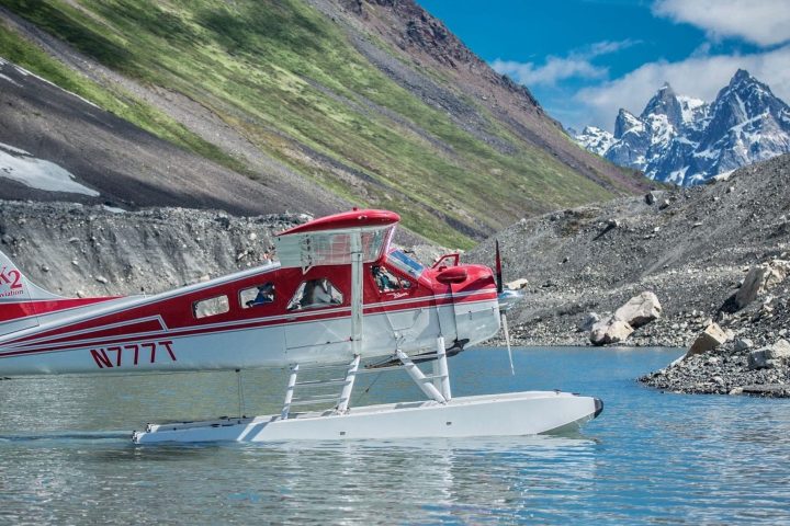 a boat sitting on top of a mountain