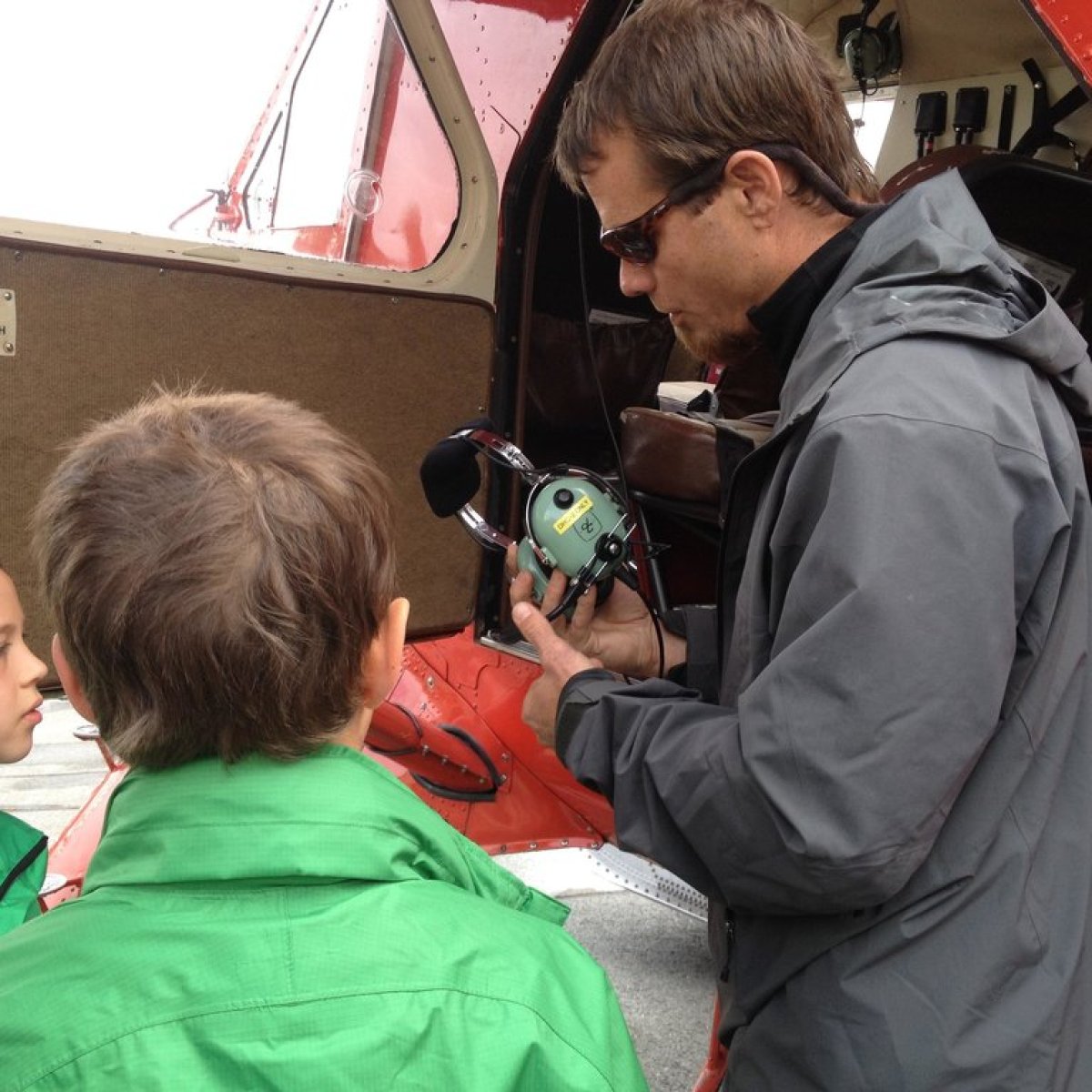 a group of people standing in front of a crowd