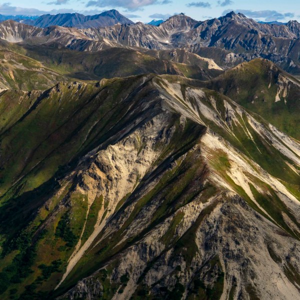 a canyon with a mountain in the background