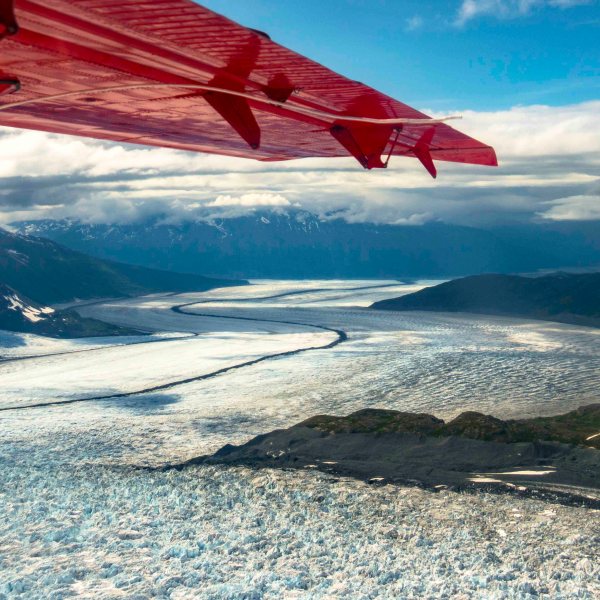 a airplane that is on the side of a mountain